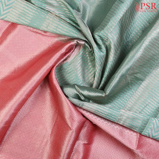 PSR Silk Sarees presents an elegant Aqua Pearl&nbsp;Banaras Silk Saree, a masterpiece of heritage and craftsmanship.