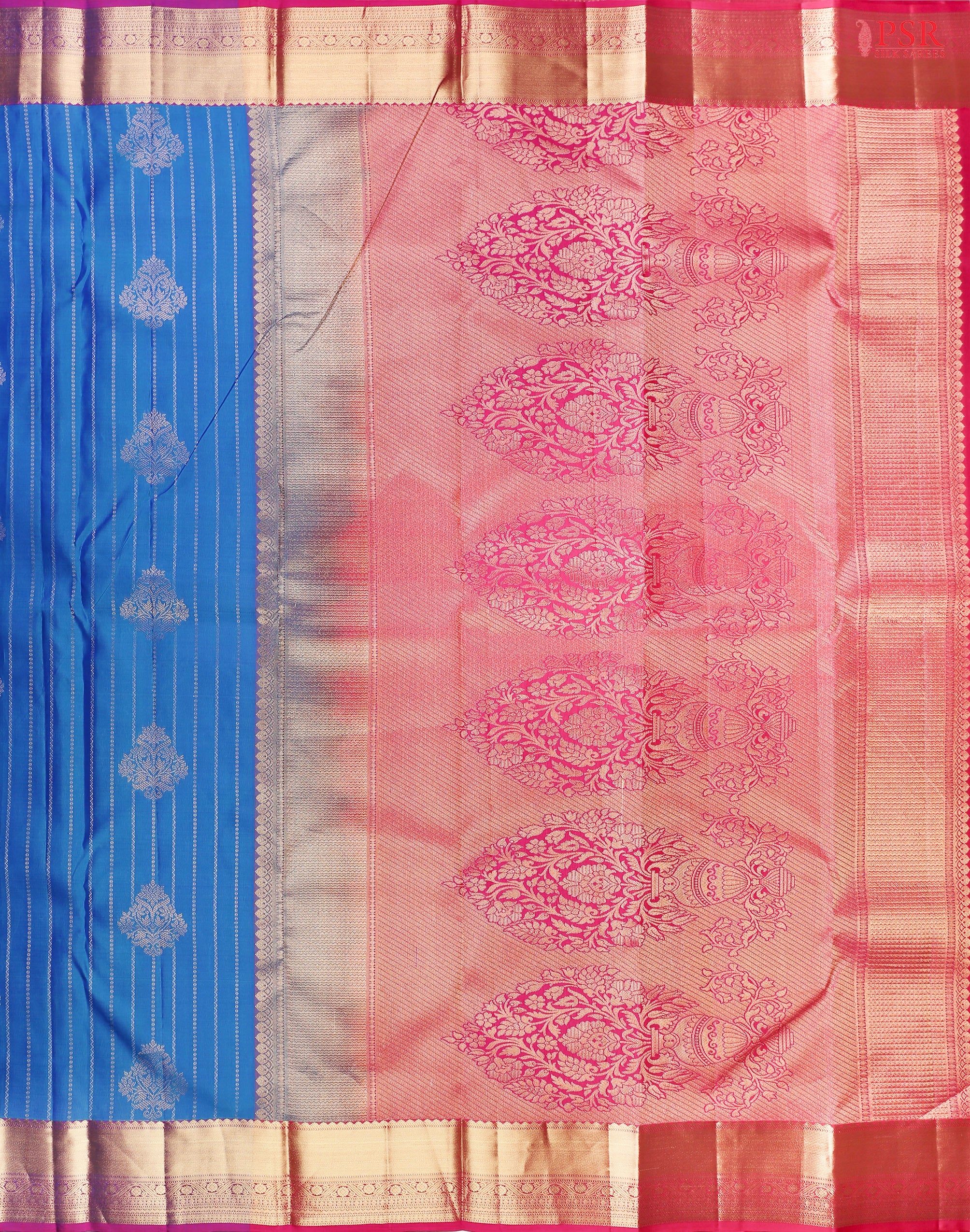 PSR Silks presents a Azure Blue Fancy Kanchipuram Silk Saree, elegantly paired with a striking Magenta Pink combination. A timeless blend of tradition and grace!