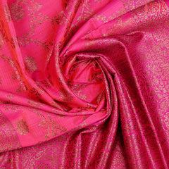 PSR Silks presents a stunning Barbie Pink Banarasi Silk Saree, beautifully contrasted with rich Magenta Pink accents.