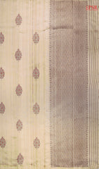 PSR Silks proudly presents a regal Beige&nbsp;Banaras Jute Silk Saree, paired with a rich Red combination.