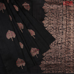 PSR Silks proudly presents a regal Black&nbsp;Banaras Jute Silk Saree, paired with a rich Red combination. 