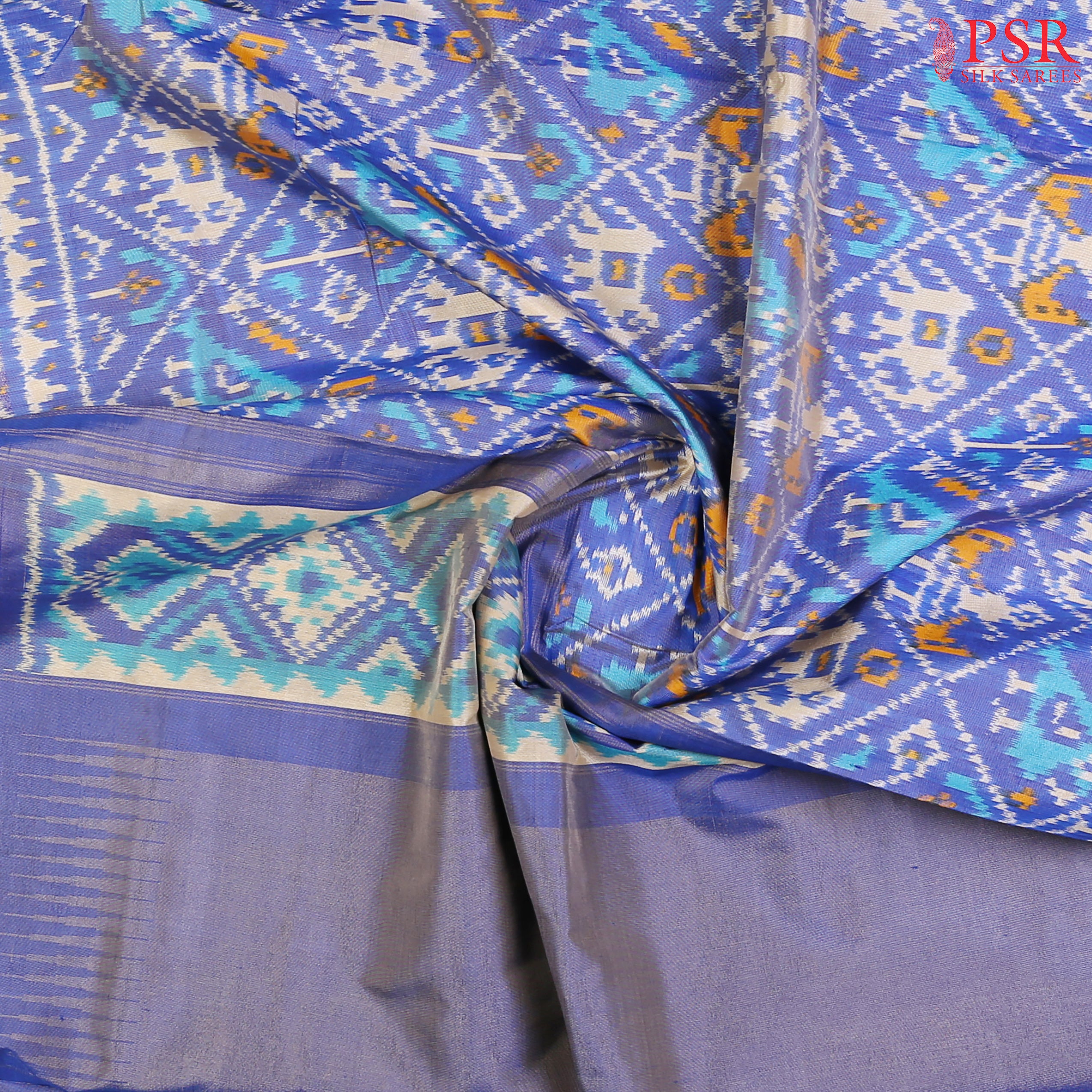 "Unveil the charm of tradition with PSR Silks’ Blurple Ikkat Pochampally Pure Silk Saree