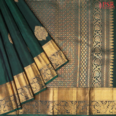 This Bottle Green Kanchipuram Silk Saree from PSR Silk Sarees is a graceful addition to the Smartika Kanjivaram collection.