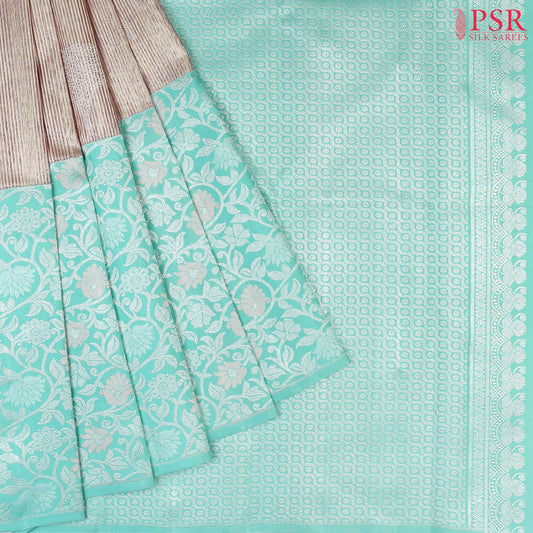 Budding Peach Kanchipuram Silk Saree from "Shrestha Kanjivaram" with Saaral Tissue Weaves, Floral Zari Motifs, One-Sided Zari Jacquard Border & Turquoise Pallu – PSR Silks