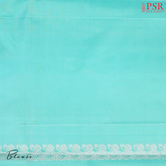 Budding Peach Kanchipuram Silk Saree from "Shrestha Kanjivaram" with Saaral Tissue Weaves, Floral Zari Motifs, One-Sided Zari Jacquard Border & Turquoise Pallu – PSR Silks