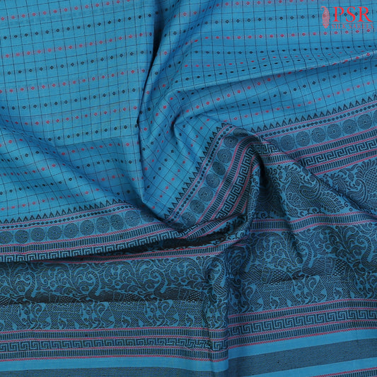 PSR Silks presents a traditionsal handloom Kalakshetra Kovai Cotton saree in a captivating Cerulean Blue, beautifully weaved pink &amp; black thread work.