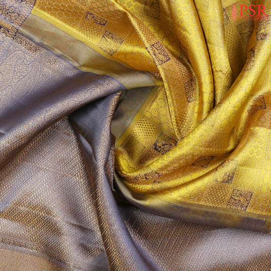 his Citrus Yellow &amp; Dark Steel Blue Kanchipuram Silk Saree from PSR Silk Sarees is a radiant addition to the "Vaichitrya Kanjivaram" collection