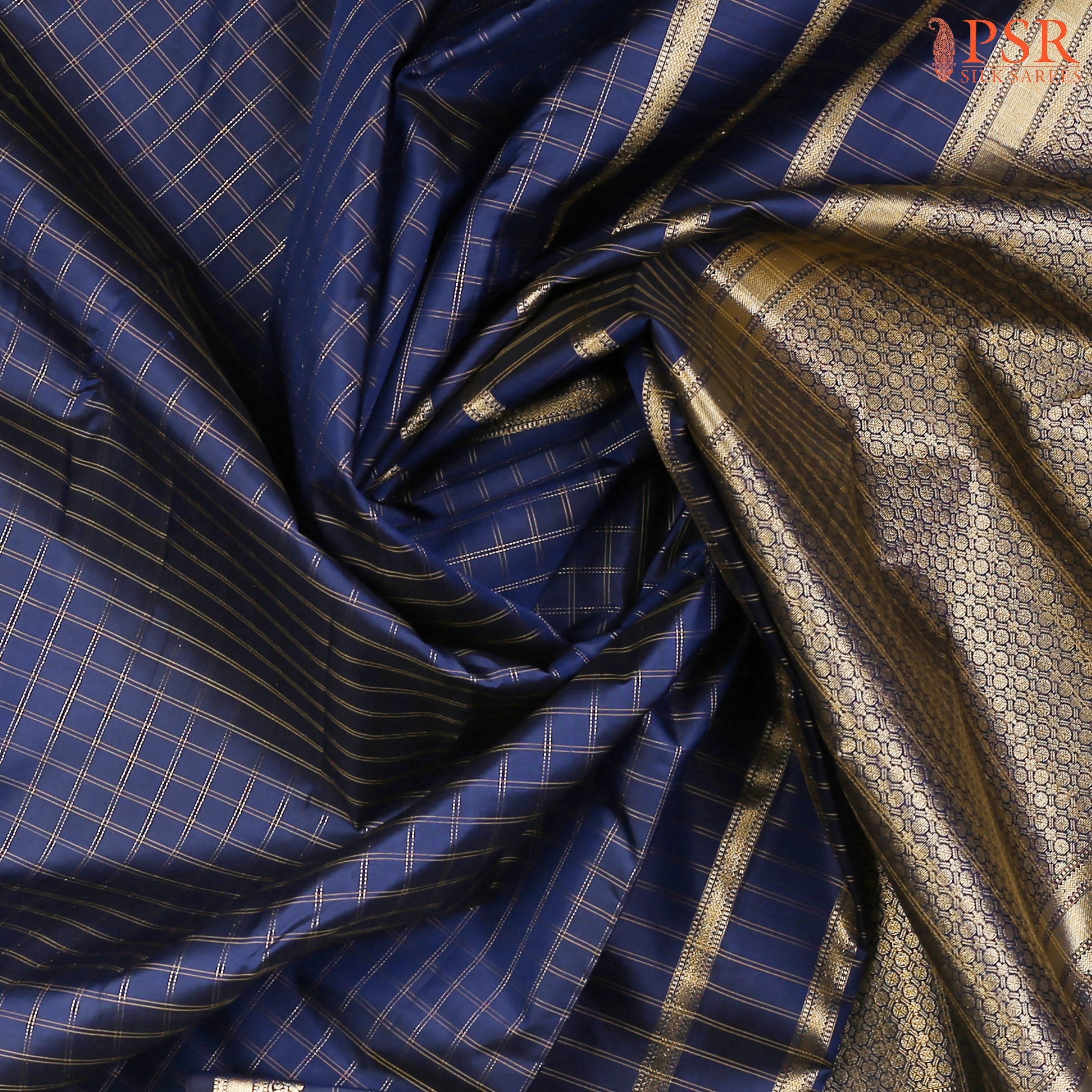 This Dark Blue Arani Silk Saree from PSR Silk Sarees is a perfect blend of tradition and sophistication.