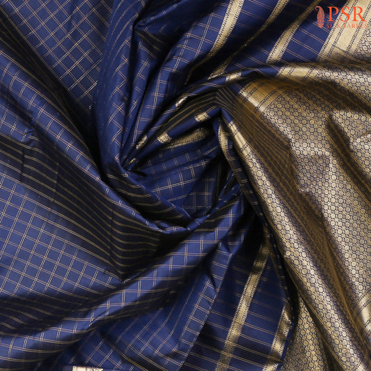 This Dark Blue Arani Silk Saree from PSR Silk Sarees is a perfect blend of tradition and sophistication.