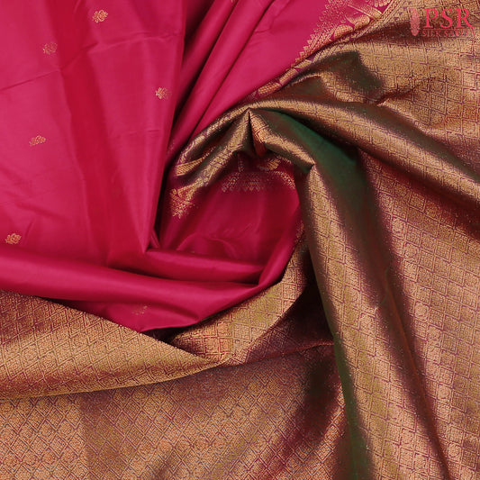 This Dark Cerise & Greenish Maroon Arani Silk Saree from PSR Silk Sarees is a refined blend of tradition and elegance