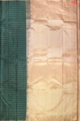 PSR Silks presents a Dark Green colored Arani Silk saree with combination of Tussar Beige color.