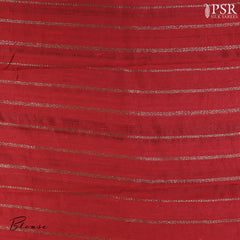 PSR Silks proudly presents a regal Dark Green&nbsp;Banaras Jute Silk Saree, paired with a rich Red&nbsp;combination.