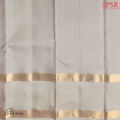 PSR Silks presents a Dark Green Fancy Kanchipuram Silk Saree, elegantly paired with a striking Gainsboro Grey combination. A timeless blend of tradition and grace!