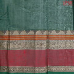 PSR Silks presents a traditional handloom Kalakshetra Kovai Cotton saree in a captivating Dark Green beautifully weaved with beige & orange thread work.