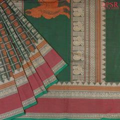 PSR Silks presents a traditional handloom Kalakshetra Kovai Cotton saree in a captivating Dark Green beautifully weaved with beige & orange thread work.