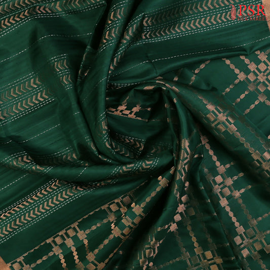 Indulge in timeless elegance with our Dark Green&nbsp;Soft Silk Saree, crafted to perfection with&nbsp;impressive copper zari jacquard stripes patterm.