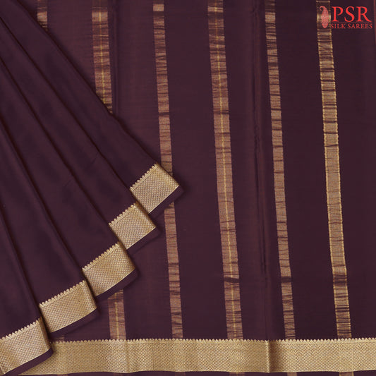 PSR Silks presents a Dark Mahogany Brown colored Mysore Silk saree.