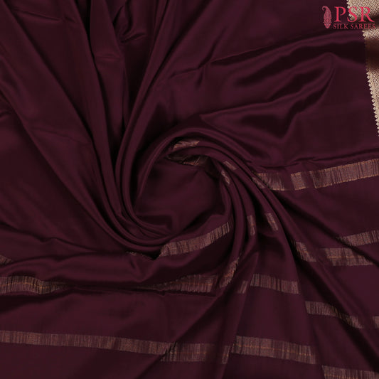 PSR Silks presents a Dark Mahogany Brown colored Mysore Silk saree.