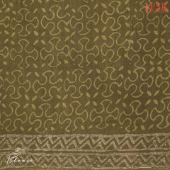 Dark Olive Pure Linen Saree featuring Jaipur-style paisley prints, a printed pallu, border, and a matching printed blouse.