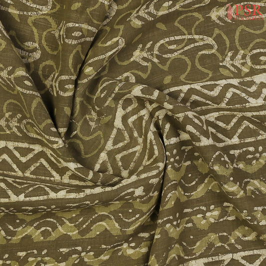 Dark Olive Pure Linen Saree featuring Jaipur-style paisley prints, a printed pallu, border, and a matching printed blouse.