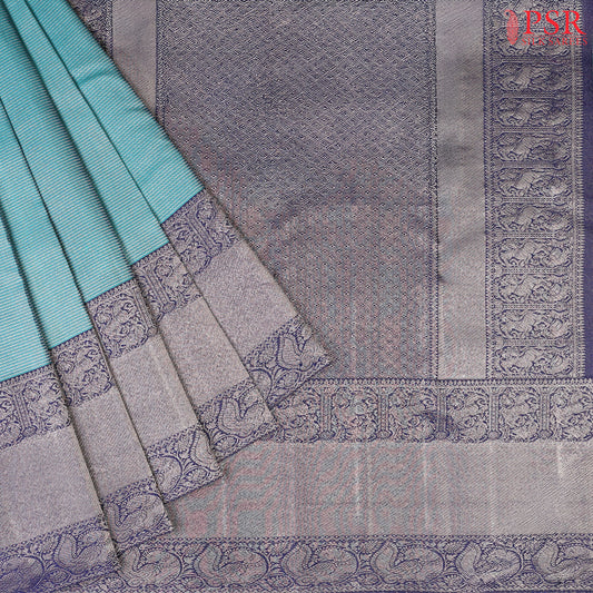 This Dark Turquoise & Berry Blue Kanchipuram Silk Saree from PSR Silk Sarees is a stunning addition to the "Vaichitrya Kanjivaram" collection