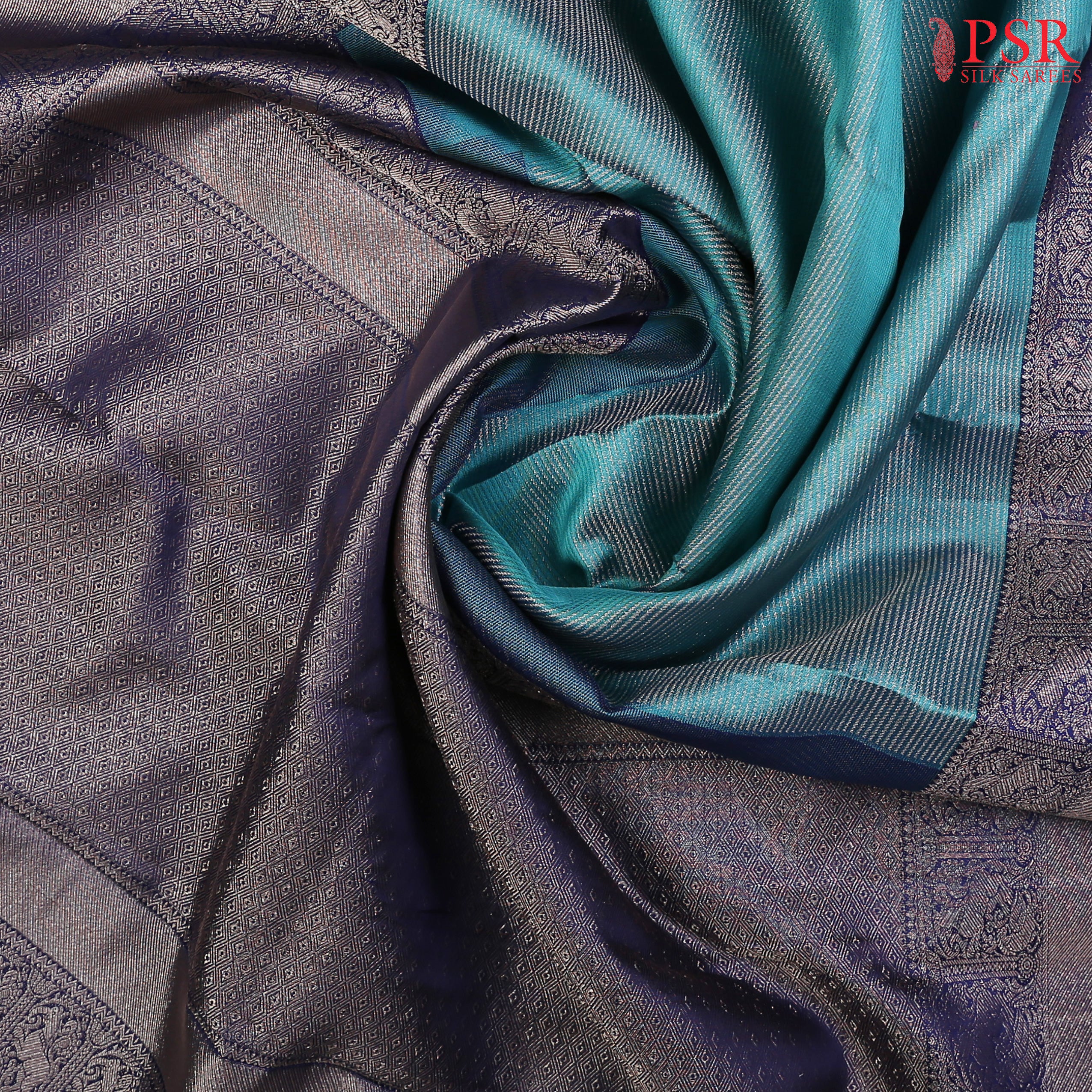 This Dark Turquoise & Berry Blue Kanchipuram Silk Saree from PSR Silk Sarees is a stunning addition to the "Vaichitrya Kanjivaram" collection