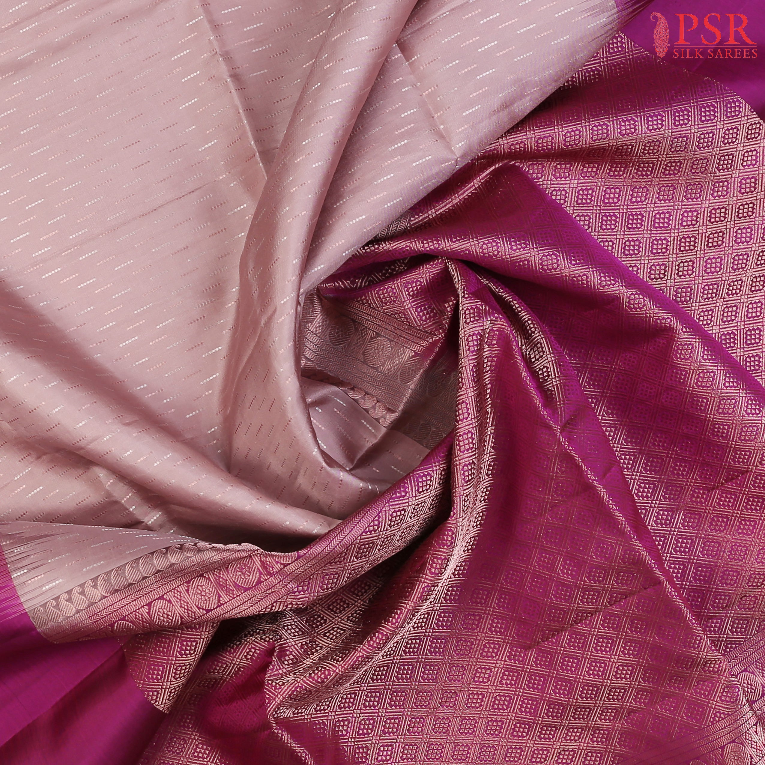 PSR Silk Sarees presents a Dusty Mauve colroed Soft Silk saree with combinaton of Tyrian Purple color