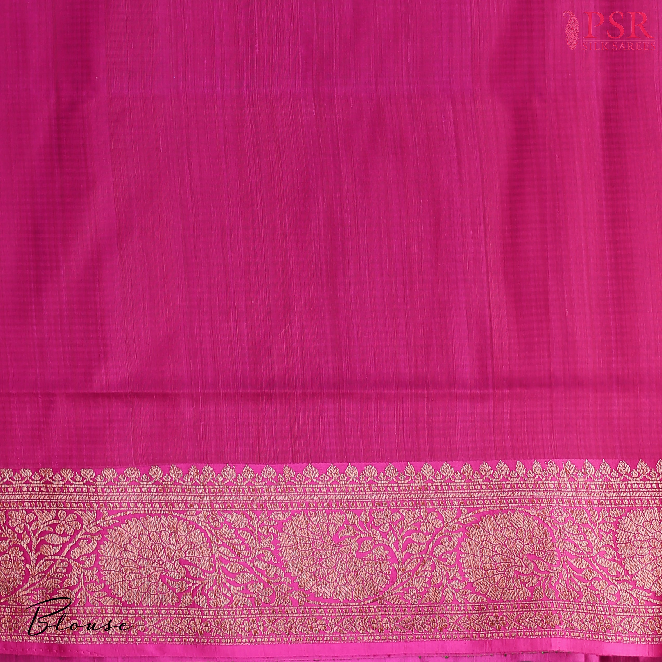 PSR Silks presents a majestic Emerald Green Banarasi Silk Saree, elegantly complemented by a vibrant Magenta hue.