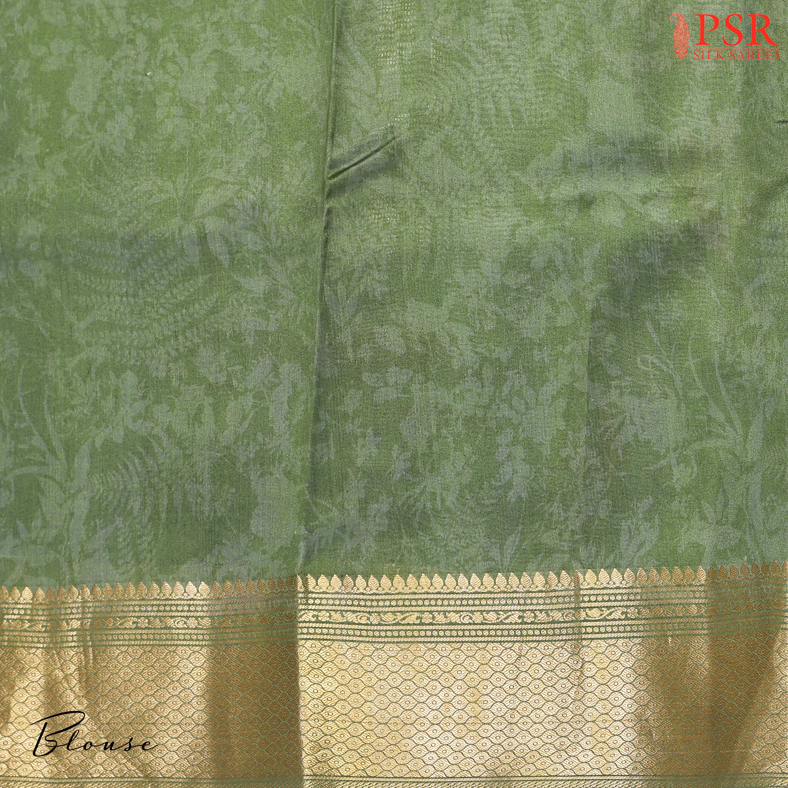 PSR Silks proudly presents an exquisite Fern Green Chiniya Silk saree that exudes elegance and charm.