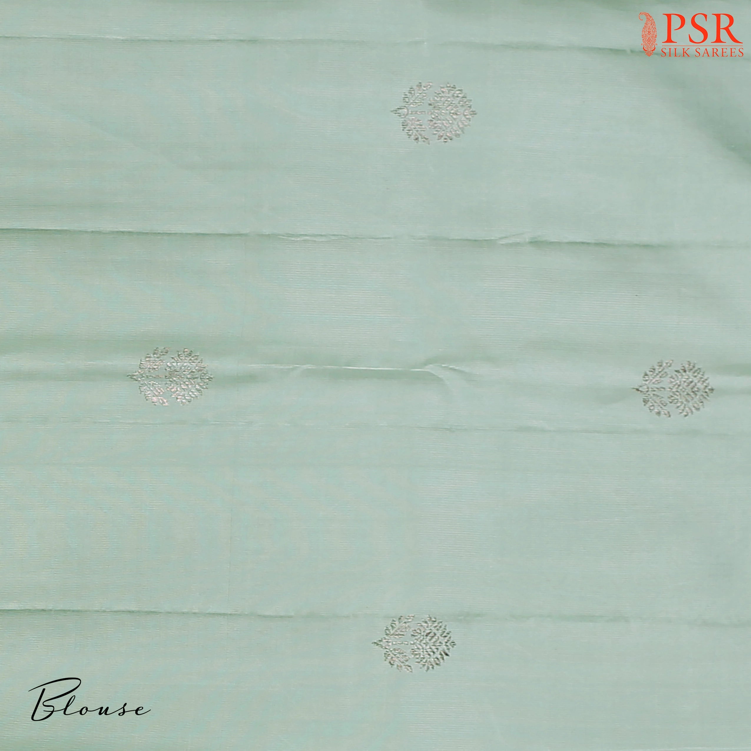 Fresh Mint Kanchipuram Silk Saree with mixed silver zari small floral motifs, silver zari pallu & border, and a matching blouse.