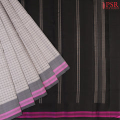 This Grey & Black Arani Silk Saree from PSR Silk Sarees is a refined blend of tradition and elegance