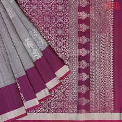 Drape yourself in sophistication with our Grey Soft Silk Saree, beautifully paired with a Tyrian Purple combination. 