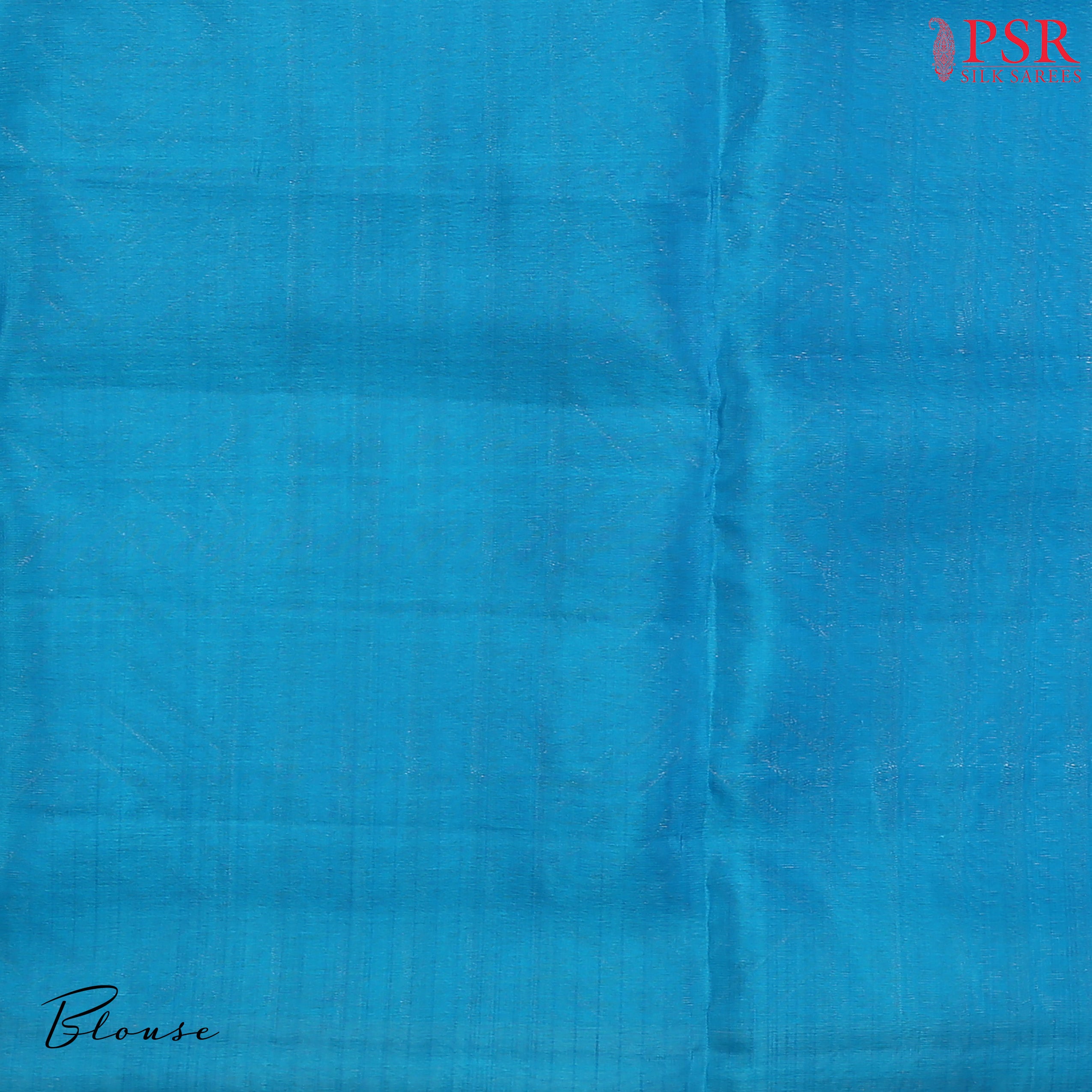 Indulge in the timeless beauty of our Haze Blue Kora Soft Silk Saree, gracefully paired with a Chintamani Blue contrast. 