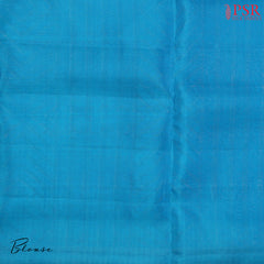 Indulge in the timeless beauty of our Haze Blue Kora Soft Silk Saree, gracefully paired with a Chintamani Blue contrast. 