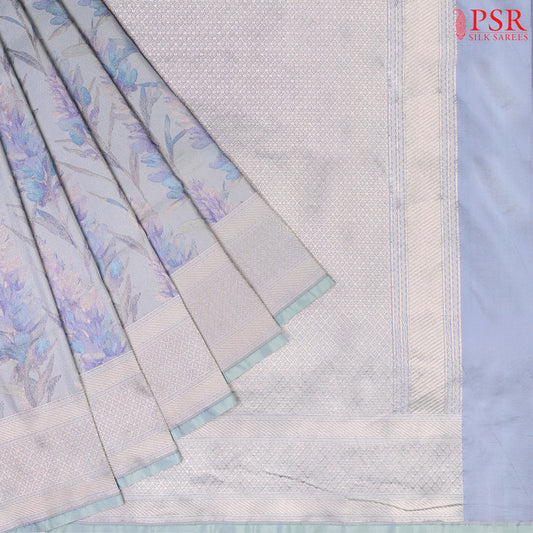 PSR Silk Sarees presents an exquisite Iceberg Blue Pashmina Tissue Silk Saree, a perfect blend of grace and tradition.