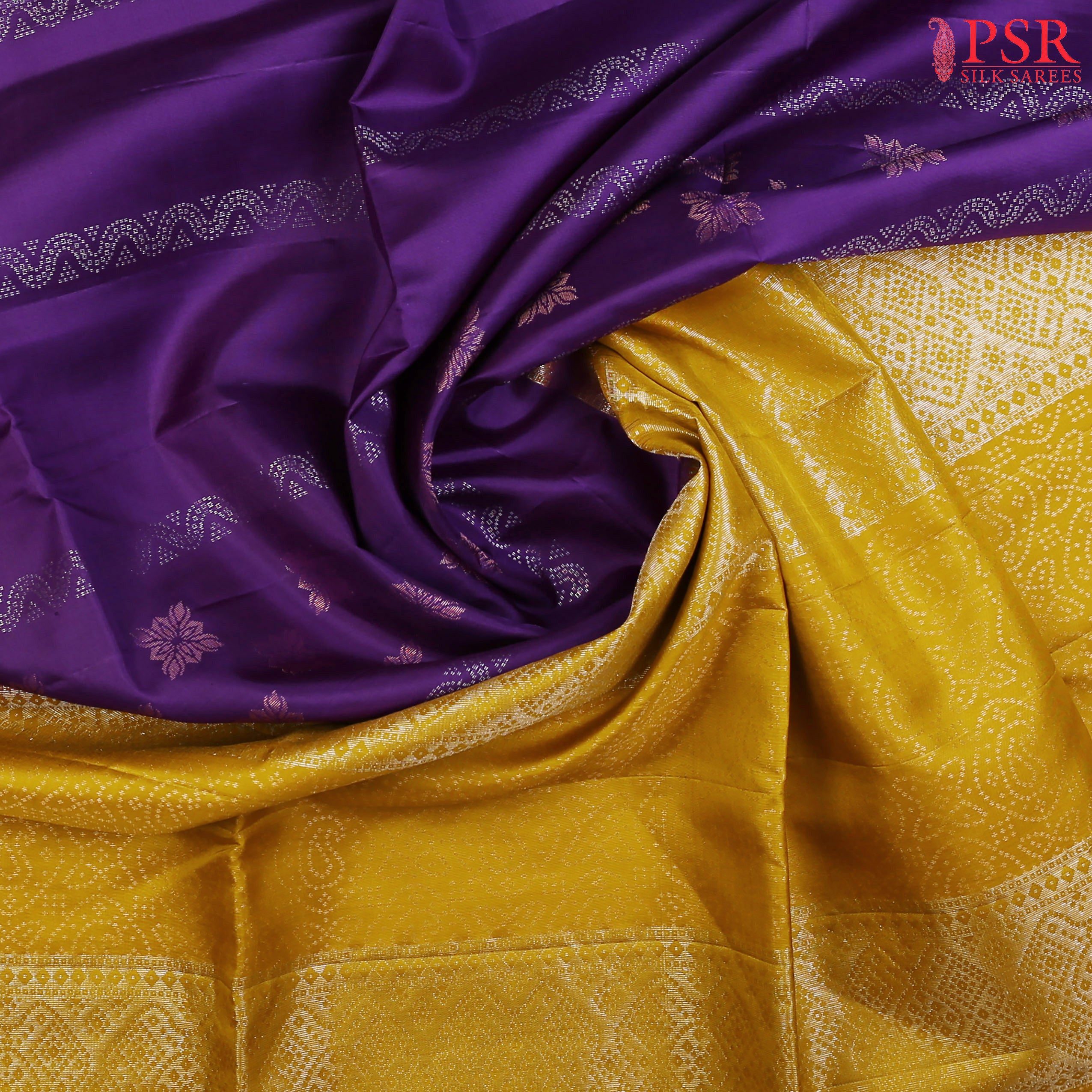 PSR Silk Sarees proudly presents the Indigo Purple Soft Silk Saree, an epitome of grace and opulence. 