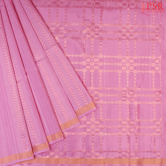 Indulge in timeless elegance with our Kobi Pink Soft Silk Saree, crafted to perfection with&nbsp;impressive copper zari jacquard stripes patterm. 