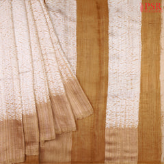 Light Beige Kadhi Tussar Silk Saree with designer prints, featuring a striped French Beige pallu, plain blouse, and matching border.