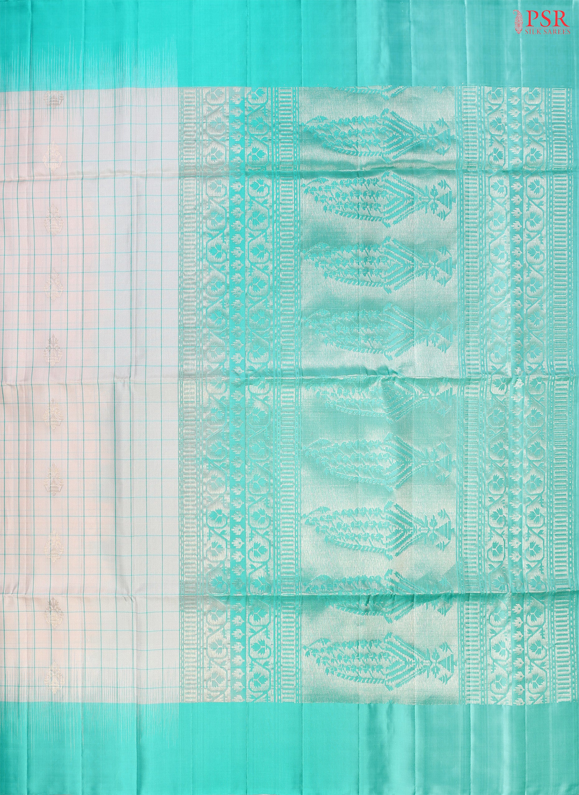 Step into sophistication with our Light Beige Soft Silk Saree, gracefully paired with an exquisite Turquoise contrast. 