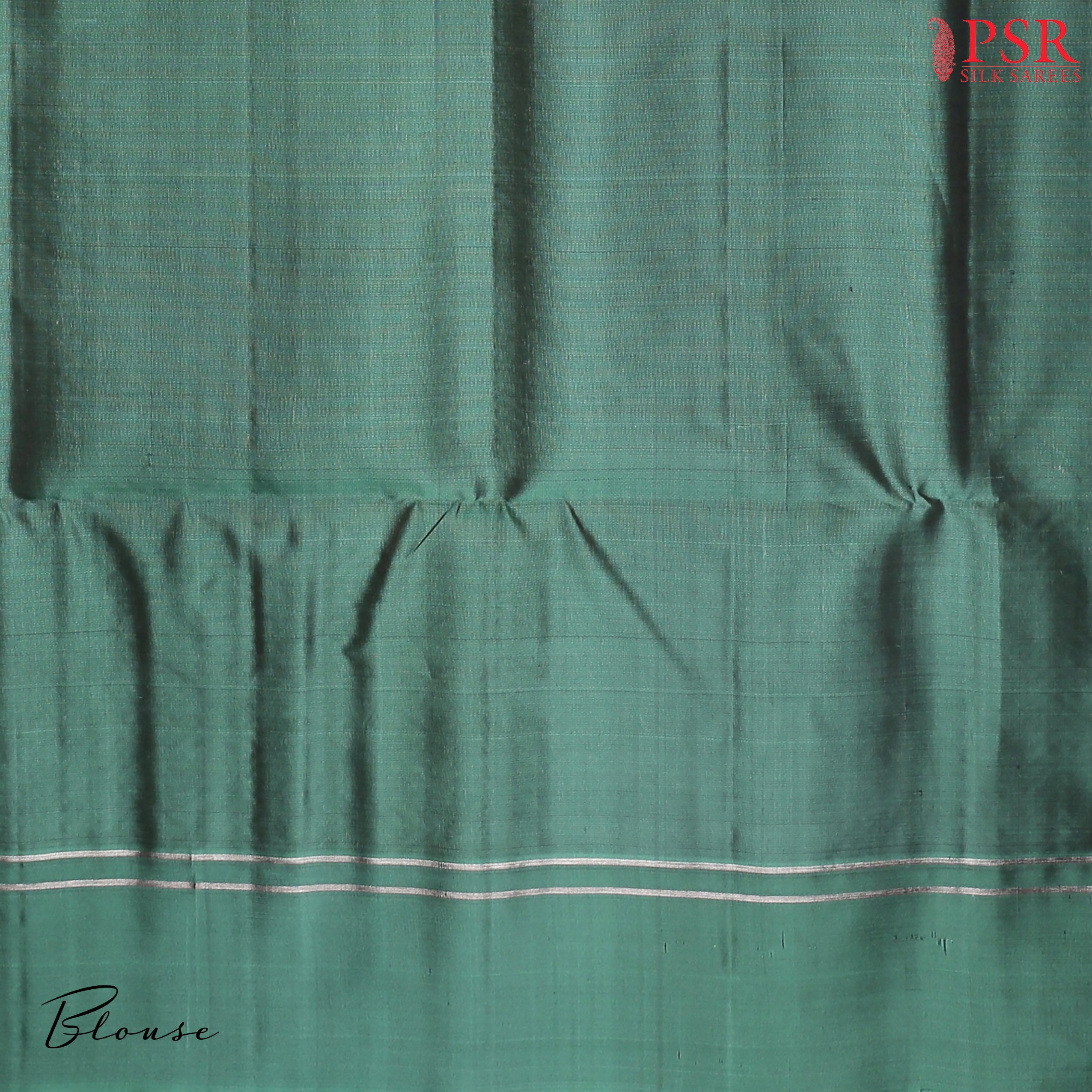 PSR Silk Sarees presents a Maroon Soft Silk Saree paired with a Dark Jade Green combination.