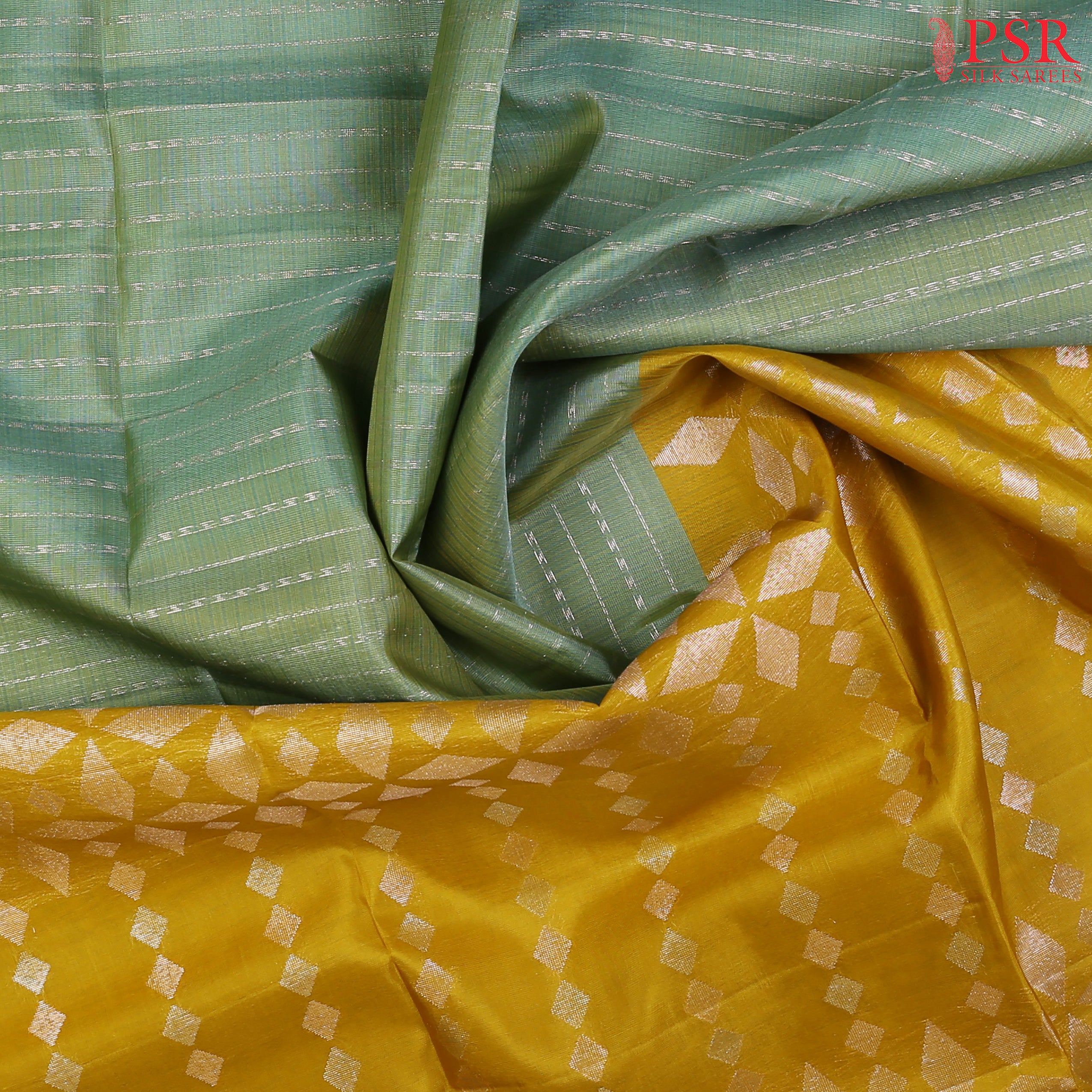 Step into elegance with our Mint Teal&nbsp;Kora Soft Silk Saree, beautifully paired with a&nbsp;Mustard Yellow&nbsp;contrast. 