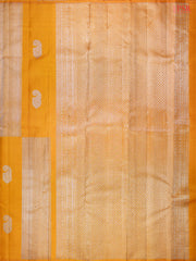 This Mustard Yellow Kanchipuram Silk Saree from PSR Silk Sarees is a radiant masterpiece from the "Shrestha Kanjivaram" collection