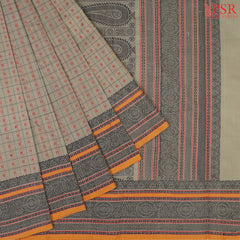 PSR Silks presents a traditional handloom Kalakshetra Kovai Cotton saree in a captivating Olive Khaki beautifully weaved with Red & black thread work.