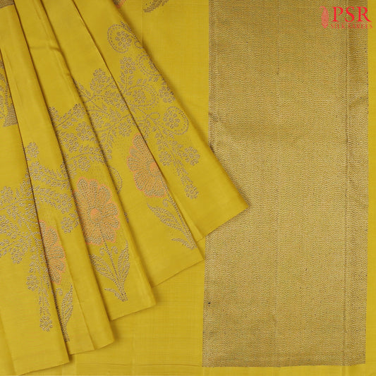 This Olive Yellow Kanchipuram Silk Saree from PSR Silk Sarees is a stunning addition to the Shrestha Kanjivaram collection