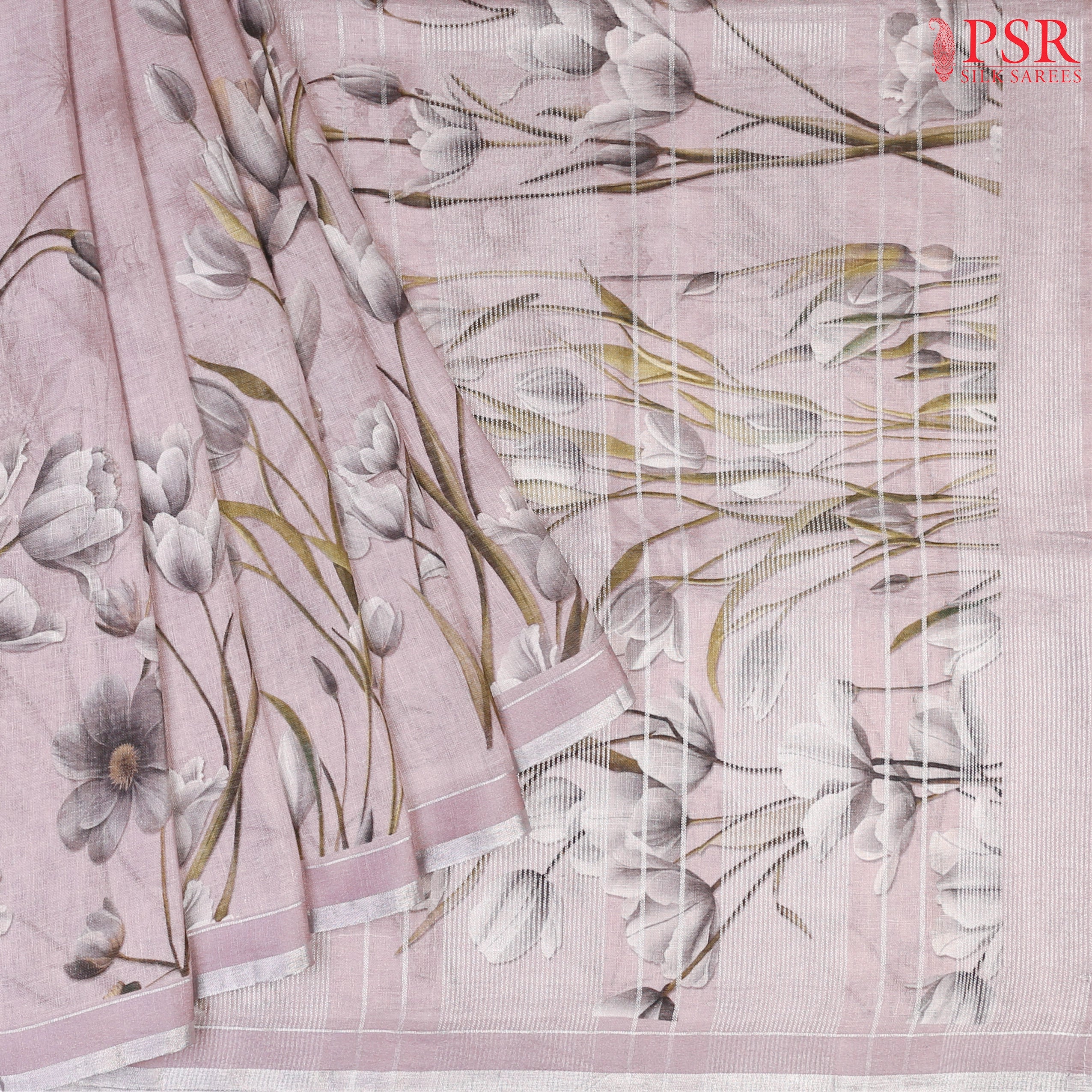 Pastel Mauve Linen Saree featuring delicate floral prints, a floral printed pallu with tissue stripes, and a matching floral printed blouse.