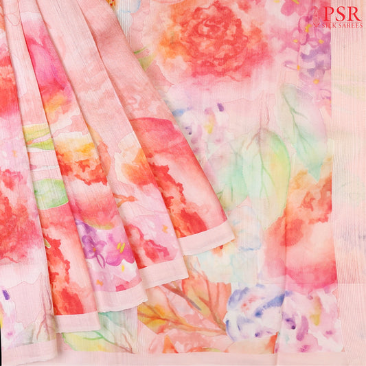 Pastel Peach Kadhi Tussar Silk Saree with colorful floral prints, paired with a matching organza pallu featuring vibrant printed designs.