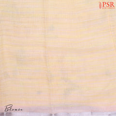 Peach Yellow Pure Linen Saree with floral prints, zari stripe pattern, a printed pallu with tissue stripes, and a matching printed blouse.