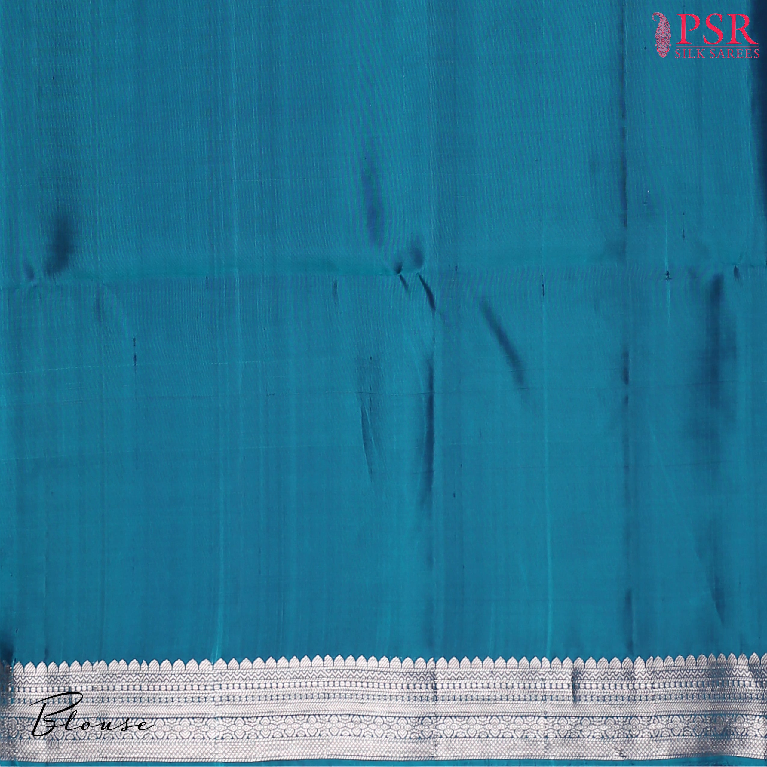  Drape yourself in the majestic charm of our Peacock Blue Soft Silk Saree, a celebration of tradition and beauty. 