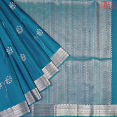  Drape yourself in the majestic charm of our Peacock Blue Soft Silk Saree, a celebration of tradition and beauty. 