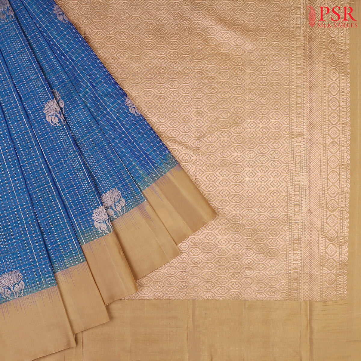 Elevate your ethnic elegance with our Peacock Blue Soft Silk Saree, gracefully paired with a rich Tan contrast